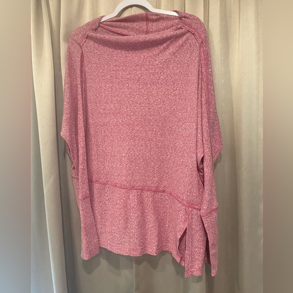 Soft pink cow neck slits on the side.